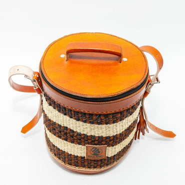 Nyungu – The Artisan Cylinder Sling Bag