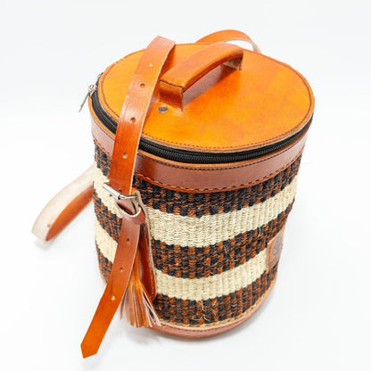 Nyungu – The Artisan Cylinder Sling Bag