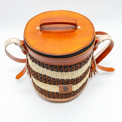 Nyungu – The Artisan Cylinder Sling Bag